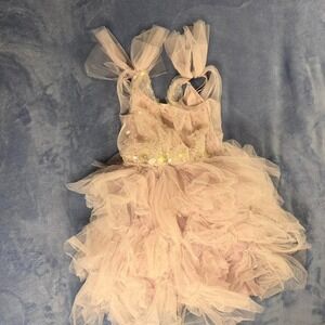 Tutu du Monde pink dress with sequins and bow detail. Size: 8-9